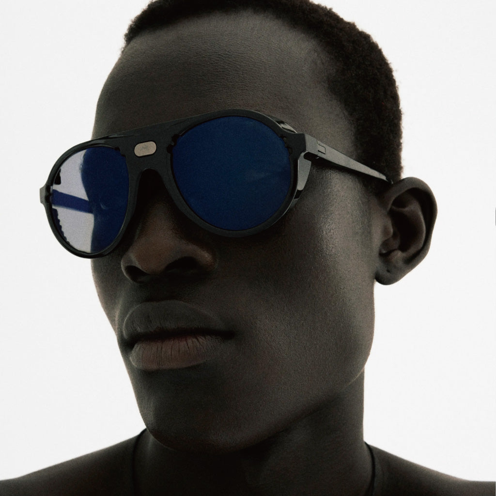 District Vision x Tracksmith Kazu Tourer Black D+ Blue Ice